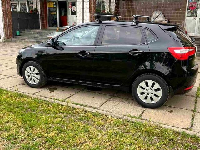 Чорний Кіа Ріо, об'ємом двигуна 1.6 л та пробігом 17600 тис. км за 7300 $, фото 12 на Automoto.ua