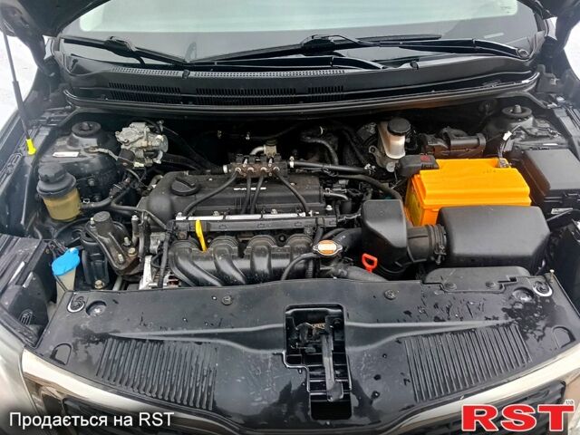 Чорний Кіа Ріо, об'ємом двигуна 1.6 л та пробігом 16000 тис. км за 7800 $, фото 11 на Automoto.ua