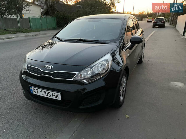 Чорний Кіа Ріо, об'ємом двигуна 1.12 л та пробігом 216 тис. км за 6700 $, фото 1 на Automoto.ua