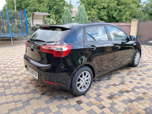 Черный Киа Рио, объемом двигателя 1 л и пробегом 172 тыс. км за 5516 $, фото 6 на Automoto.ua