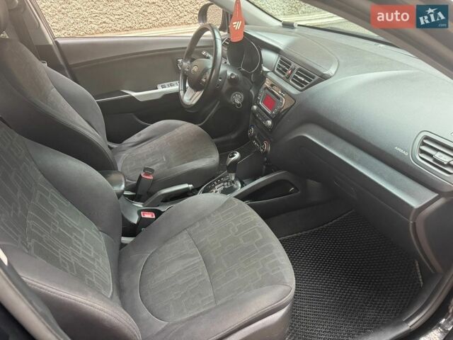 Чорний Кіа Ріо, об'ємом двигуна 1.59 л та пробігом 165 тис. км за 6400 $, фото 9 на Automoto.ua