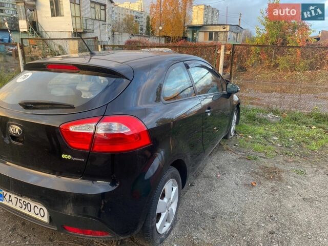 Черный Киа Рио, объемом двигателя 1.12 л и пробегом 177 тыс. км за 1700 $, фото 7 на Automoto.ua