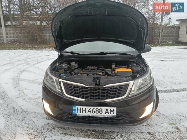 Чорний Кіа Ріо, об'ємом двигуна 1.6 л та пробігом 157 тис. км за 8300 $, фото 5 на Automoto.ua