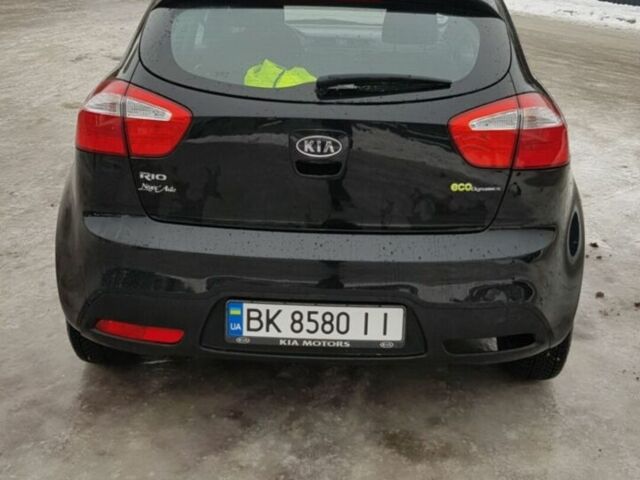 Чорний Кіа Ріо, об'ємом двигуна 1.1 л та пробігом 143 тис. км за 6830 $, фото 3 на Automoto.ua