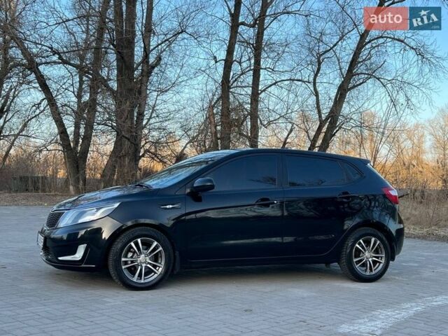 Черный Киа Рио, объемом двигателя 1.6 л и пробегом 155 тыс. км за 7300 $, фото 2 на Automoto.ua