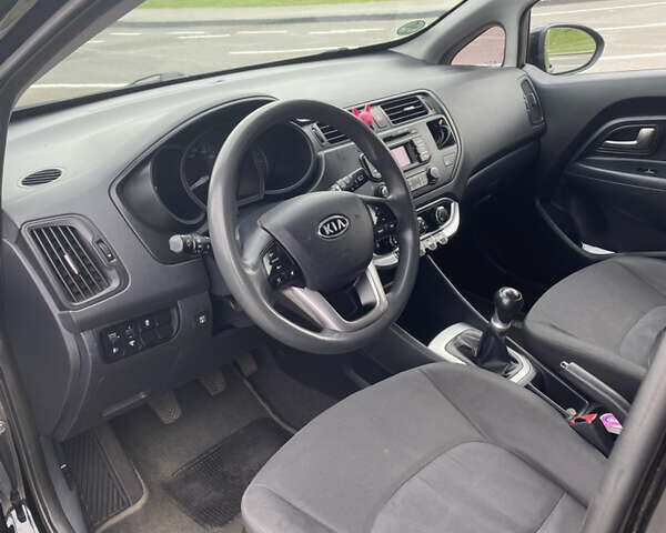 Чорний Кіа Ріо, об'ємом двигуна 1.2 л та пробігом 200 тис. км за 5700 $, фото 7 на Automoto.ua