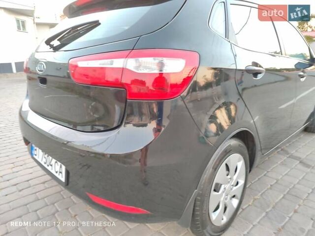 Чорний Кіа Ріо, об'ємом двигуна 1.4 л та пробігом 41 тис. км за 8500 $, фото 22 на Automoto.ua
