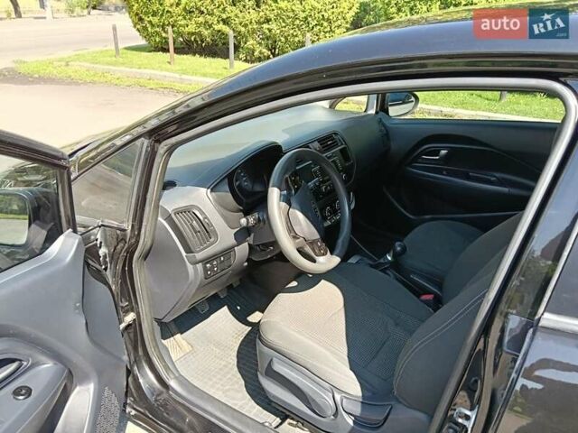 Черный Киа Рио, объемом двигателя 1.25 л и пробегом 252 тыс. км за 5999 $, фото 2 на Automoto.ua