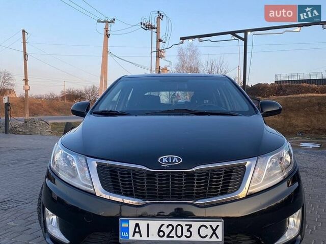 Черный Киа Рио, объемом двигателя 1.4 л и пробегом 170 тыс. км за 6700 $, фото 2 на Automoto.ua