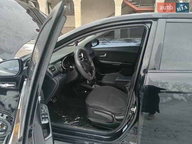 Чорний Кіа Ріо, об'ємом двигуна 1.6 л та пробігом 157 тис. км за 8300 $, фото 4 на Automoto.ua