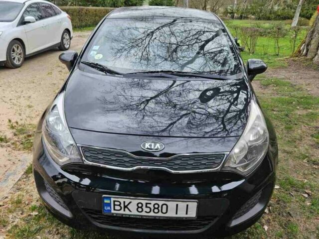 Чорний Кіа Ріо, об'ємом двигуна 1.1 л та пробігом 143 тис. км за 6830 $, фото 2 на Automoto.ua