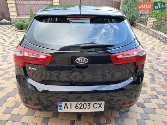 Черный Киа Рио, объемом двигателя 1.4 л и пробегом 172 тыс. км за 5700 $, фото 7 на Automoto.ua