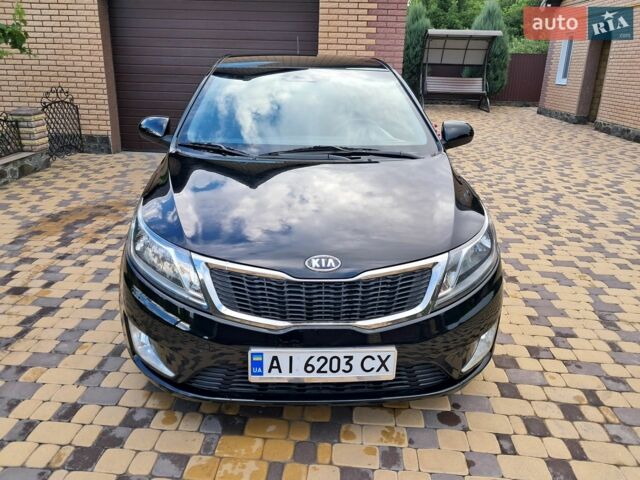 Черный Киа Рио, объемом двигателя 1.4 л и пробегом 172 тыс. км за 5700 $, фото 1 на Automoto.ua