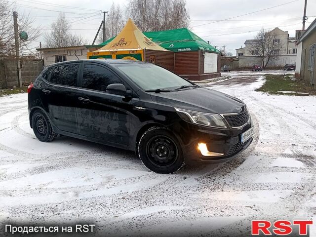 Чорний Кіа Ріо, об'ємом двигуна 1.6 л та пробігом 16000 тис. км за 7800 $, фото 4 на Automoto.ua