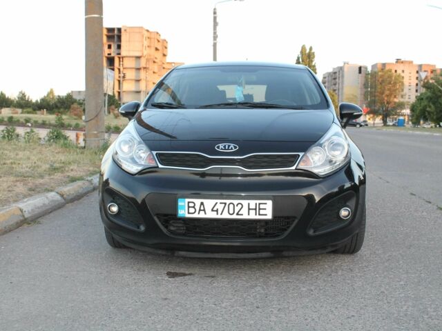 Черный Киа Рио, объемом двигателя 1.1 л и пробегом 235 тыс. км за 7000 $, фото 1 на Automoto.ua