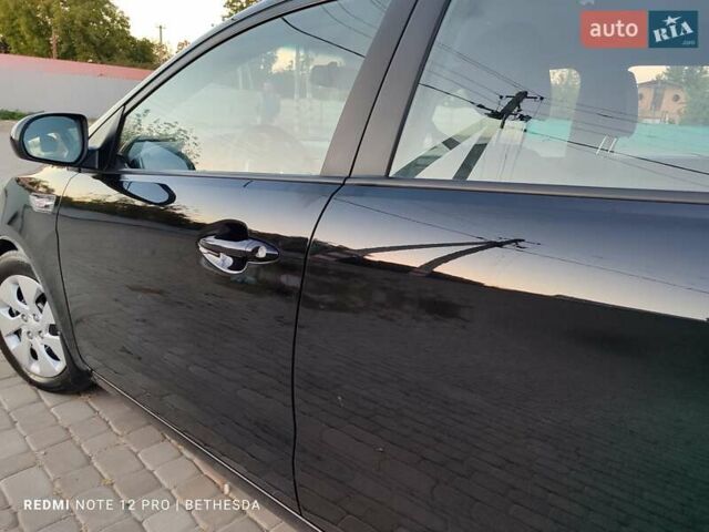 Черный Киа Рио, объемом двигателя 1.4 л и пробегом 42 тыс. км за 8200 $, фото 27 на Automoto.ua