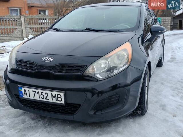 Черный Киа Рио, объемом двигателя 1.6 л и пробегом 149 тыс. км за 7200 $, фото 4 на Automoto.ua