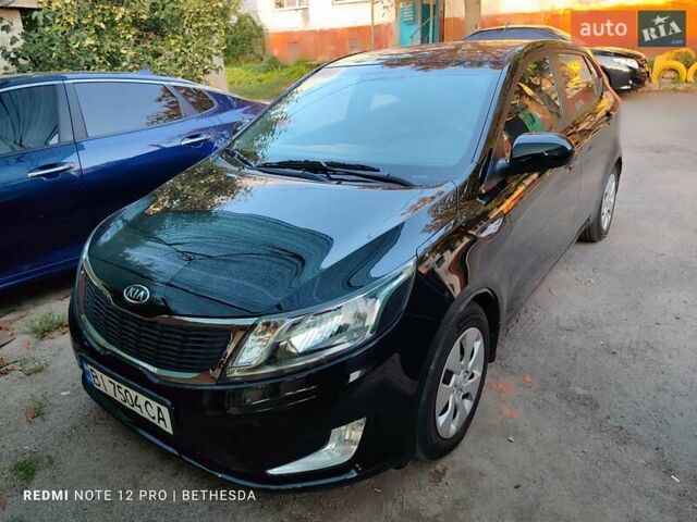 Чорний Кіа Ріо, об'ємом двигуна 1.4 л та пробігом 41 тис. км за 8500 $, фото 1 на Automoto.ua