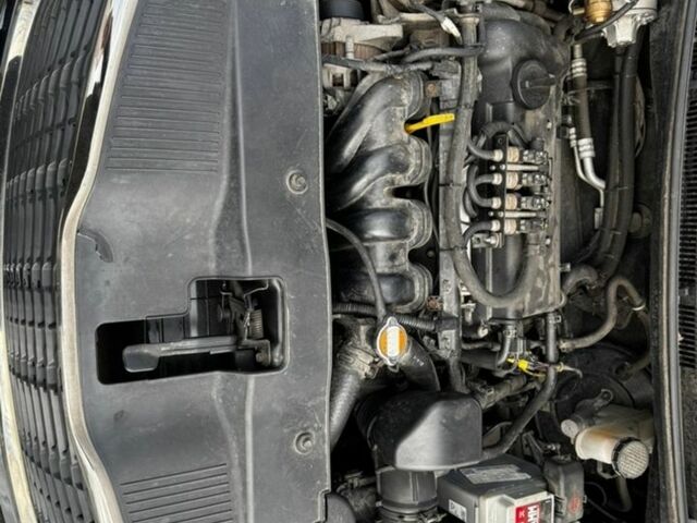 Черный Киа Рио, объемом двигателя 1.4 л и пробегом 125 тыс. км за 6000 $, фото 3 на Automoto.ua
