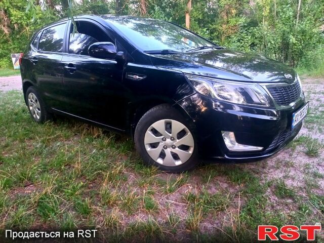 Чорний Кіа Ріо, об'ємом двигуна 1.6 л та пробігом 113 тис. км за 8500 $, фото 1 на Automoto.ua