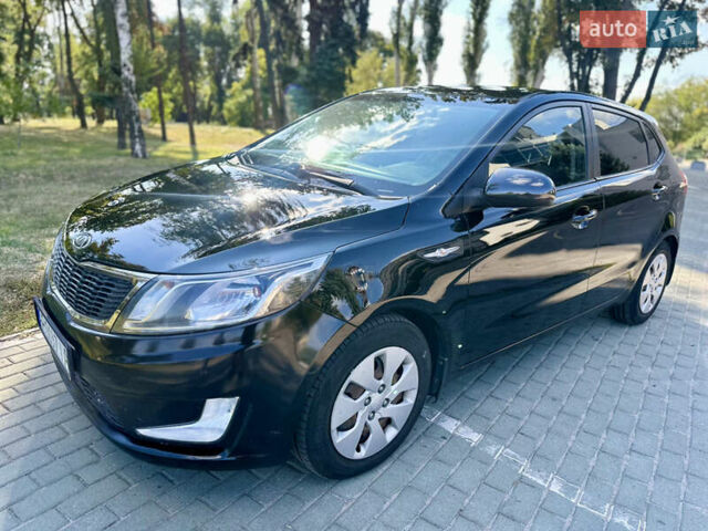 Чорний Кіа Ріо, об'ємом двигуна 1.59 л та пробігом 156 тис. км за 6700 $, фото 9 на Automoto.ua