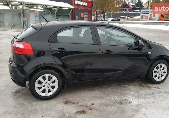 Черный Киа Рио, объемом двигателя 1.1 л и пробегом 143 тыс. км за 6830 $, фото 5 на Automoto.ua