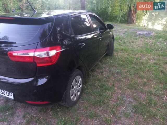 Чорний Кіа Ріо, об'ємом двигуна 1.59 л та пробігом 113 тис. км за 8500 $, фото 13 на Automoto.ua