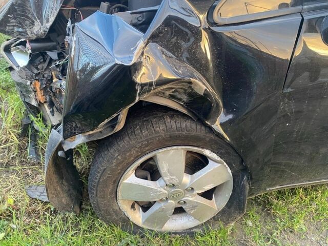 Чорний Кіа Ріо, об'ємом двигуна 1.1 л та пробігом 177 тис. км за 1508 $, фото 12 на Automoto.ua