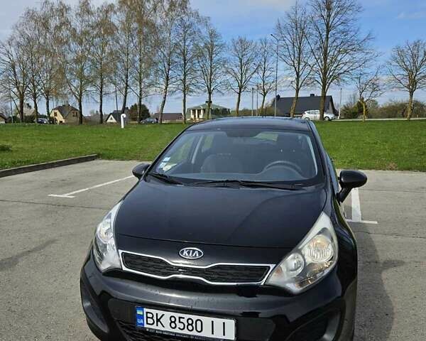 Чорний Кіа Ріо, об'ємом двигуна 1.1 л та пробігом 143 тис. км за 6830 $, фото 10 на Automoto.ua