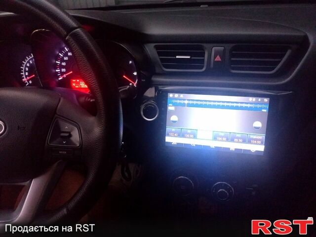 Чорний Кіа Ріо, об'ємом двигуна 1.6 л та пробігом 113 тис. км за 8500 $, фото 11 на Automoto.ua