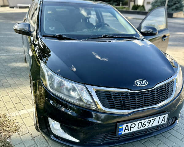 Чорний Кіа Ріо, об'ємом двигуна 1.59 л та пробігом 156 тис. км за 6700 $, фото 24 на Automoto.ua
