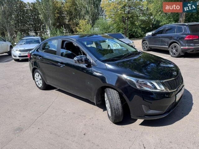 Чорний Кіа Ріо, об'ємом двигуна 1.4 л та пробігом 53 тис. км за 8501 $, фото 5 на Automoto.ua