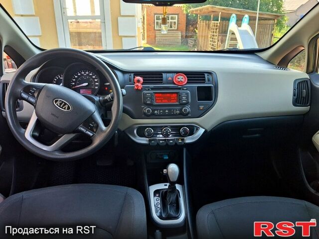 Чорний Кіа Ріо, об'ємом двигуна 1.6 л та пробігом 144 тис. км за 7300 $, фото 8 на Automoto.ua