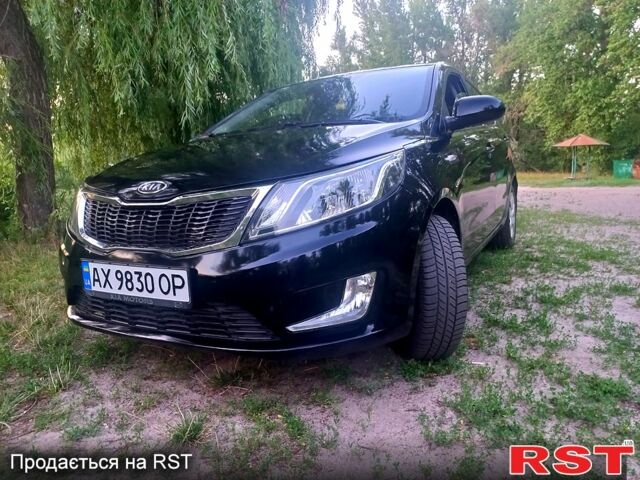 Чорний Кіа Ріо, об'ємом двигуна 1.6 л та пробігом 113 тис. км за 8500 $, фото 3 на Automoto.ua