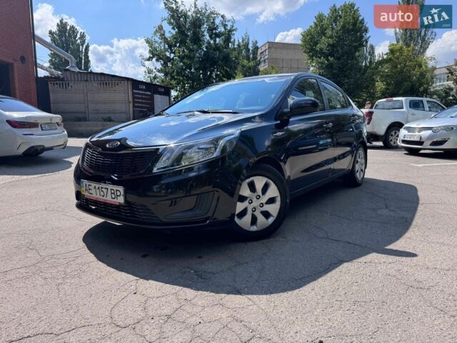 Чорний Кіа Ріо, об'ємом двигуна 1.4 л та пробігом 53 тис. км за 8501 $, фото 13 на Automoto.ua