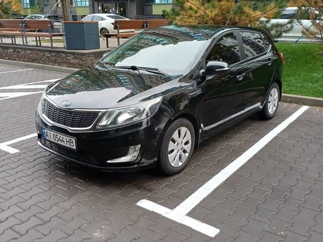 Черный Киа Рио, объемом двигателя 1.6 л и пробегом 120 тыс. км за 8900 $, фото 1 на Automoto.ua