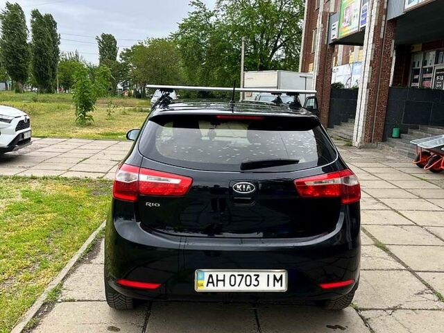 Чорний Кіа Ріо, об'ємом двигуна 1.6 л та пробігом 17600 тис. км за 7300 $, фото 3 на Automoto.ua