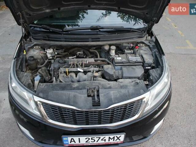 Чорний Кіа Ріо, об'ємом двигуна 1.6 л та пробігом 217 тис. км за 6200 $, фото 6 на Automoto.ua