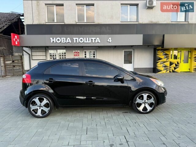 Чорний Кіа Ріо, об'ємом двигуна 1.59 л та пробігом 128 тис. км за 5500 $, фото 11 на Automoto.ua