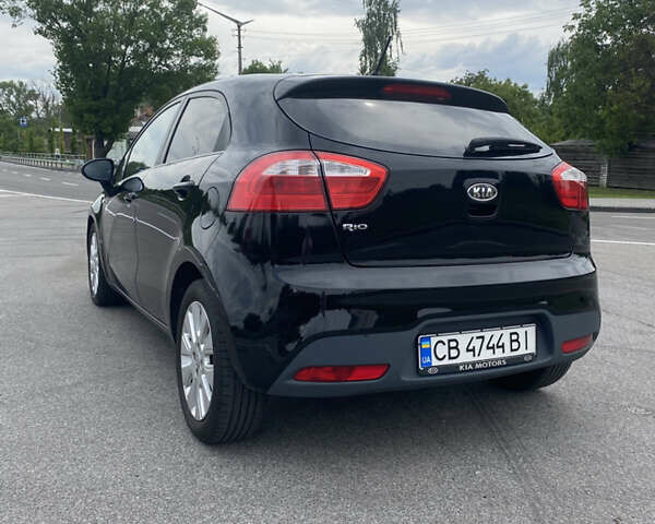 Чорний Кіа Ріо, об'ємом двигуна 1.2 л та пробігом 200 тис. км за 5700 $, фото 11 на Automoto.ua