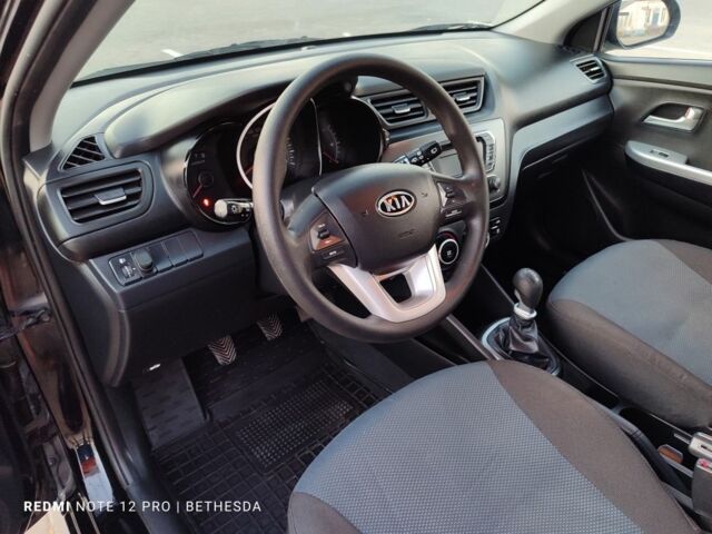Черный Киа Рио, объемом двигателя 1.4 л и пробегом 41 тыс. км за 8200 $, фото 16 на Automoto.ua
