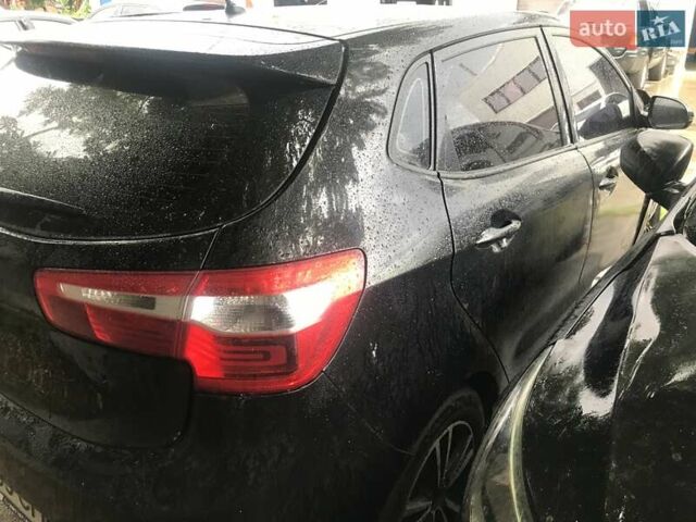 Чорний Кіа Ріо, об'ємом двигуна 1.6 л та пробігом 137 тис. км за 2999 $, фото 7 на Automoto.ua