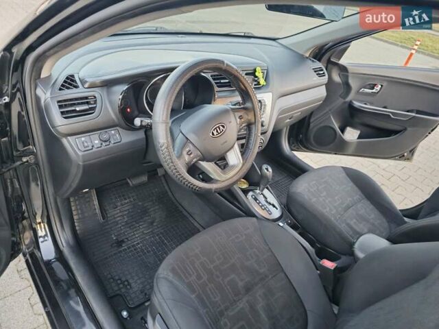 Черный Киа Рио, объемом двигателя 1.59 л и пробегом 137 тыс. км за 7750 $, фото 5 на Automoto.ua