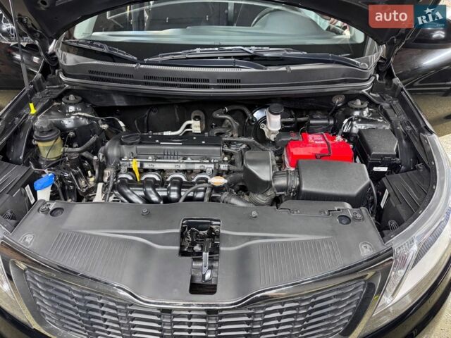 Чорний Кіа Ріо, об'ємом двигуна 1.4 л та пробігом 53 тис. км за 8501 $, фото 11 на Automoto.ua