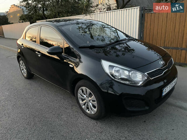 Чорний Кіа Ріо, об'ємом двигуна 1.12 л та пробігом 216 тис. км за 6700 $, фото 2 на Automoto.ua