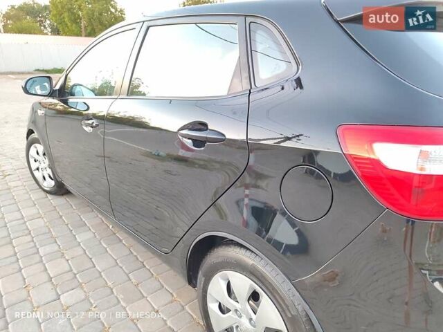 Чорний Кіа Ріо, об'ємом двигуна 1.4 л та пробігом 41 тис. км за 8500 $, фото 27 на Automoto.ua