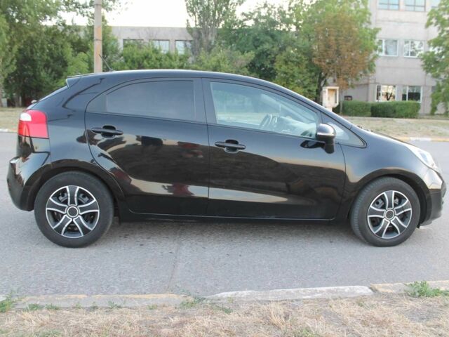 Черный Киа Рио, объемом двигателя 1.1 л и пробегом 235 тыс. км за 6203 $, фото 4 на Automoto.ua