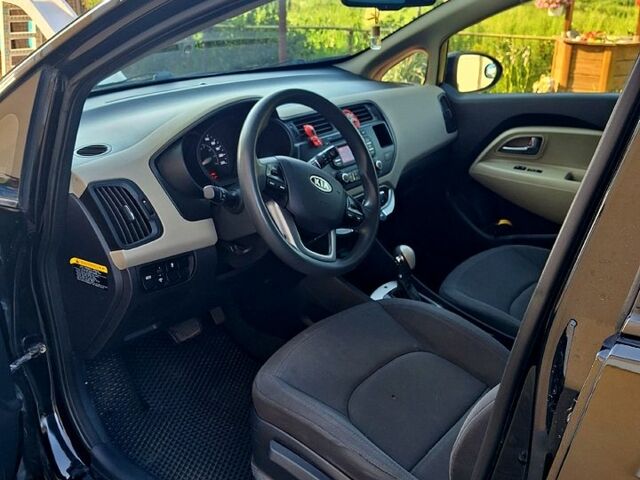 Чорний Кіа Ріо, об'ємом двигуна 1.6 л та пробігом 144 тис. км за 7300 $, фото 7 на Automoto.ua