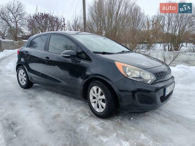 Черный Киа Рио, объемом двигателя 1.6 л и пробегом 149 тыс. км за 7200 $, фото 1 на Automoto.ua