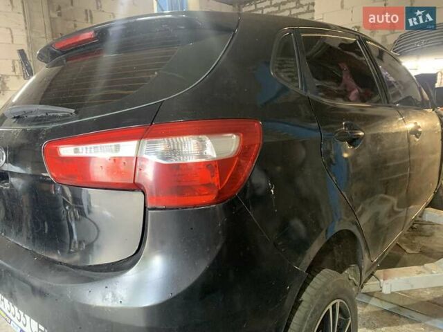 Чорний Кіа Ріо, об'ємом двигуна 1.6 л та пробігом 137 тис. км за 2999 $, фото 6 на Automoto.ua